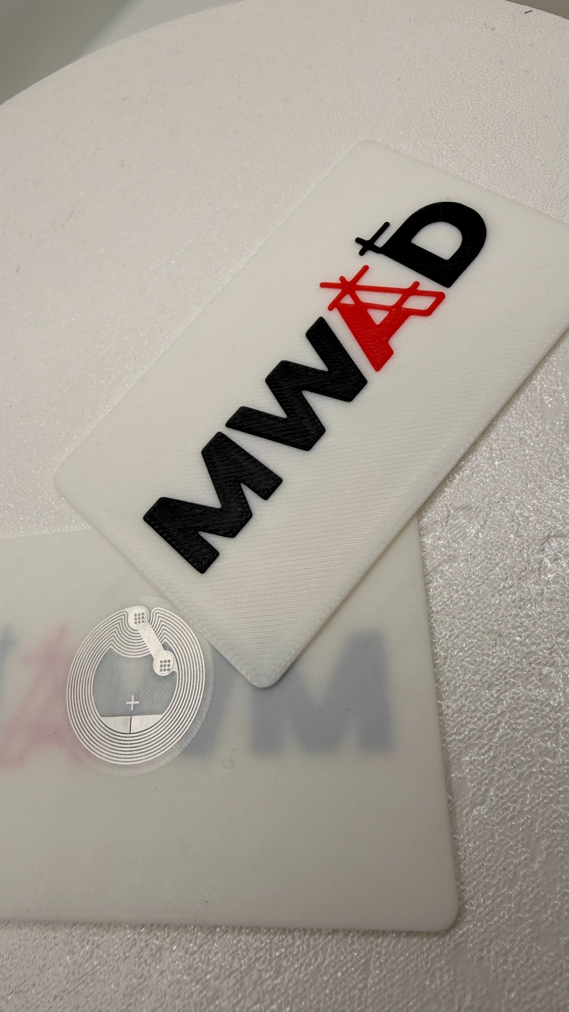 Custom NFC business card with visible NFC tag insert