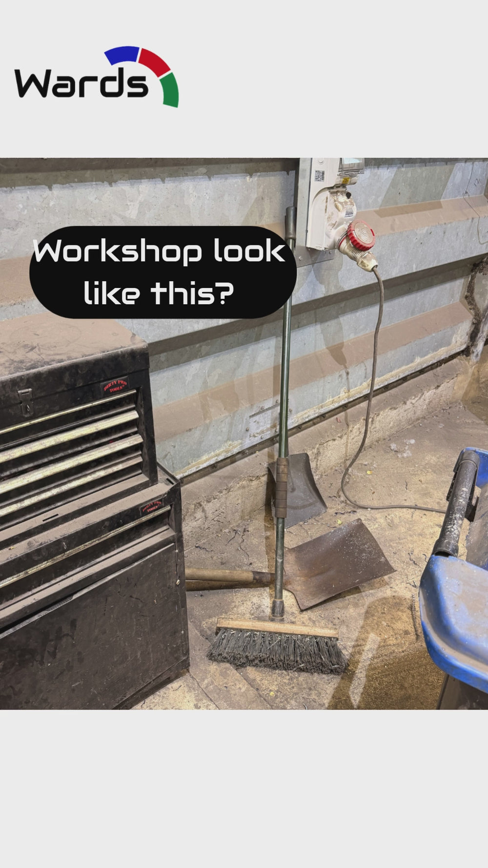 Wall-mounted broom holder product demonstration showing the holder in use