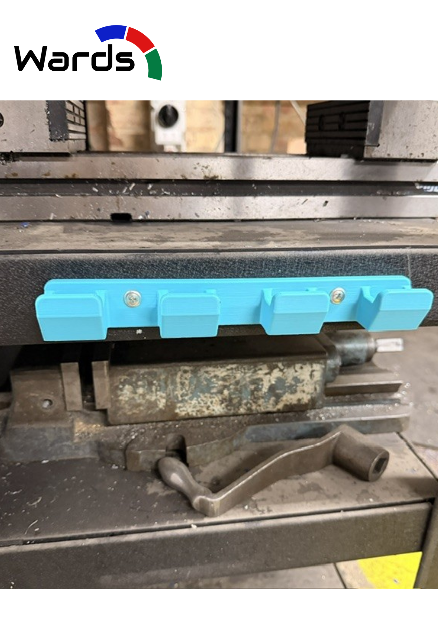 Empty four-slot trigger spray bottle wall rack showing mounting holes