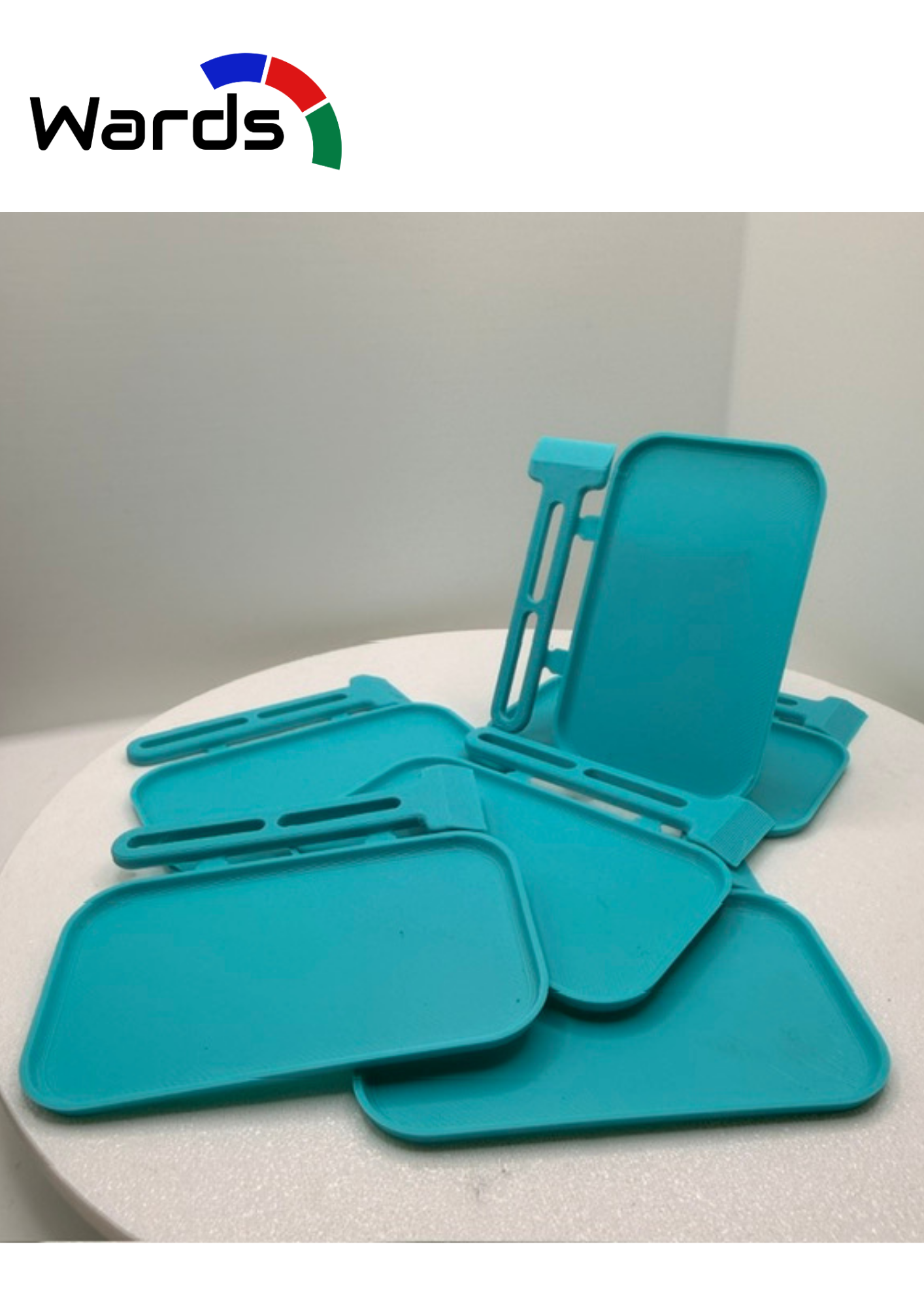 Turquoise disposable epoxy mixing pads and spatulas made by Wards Additive